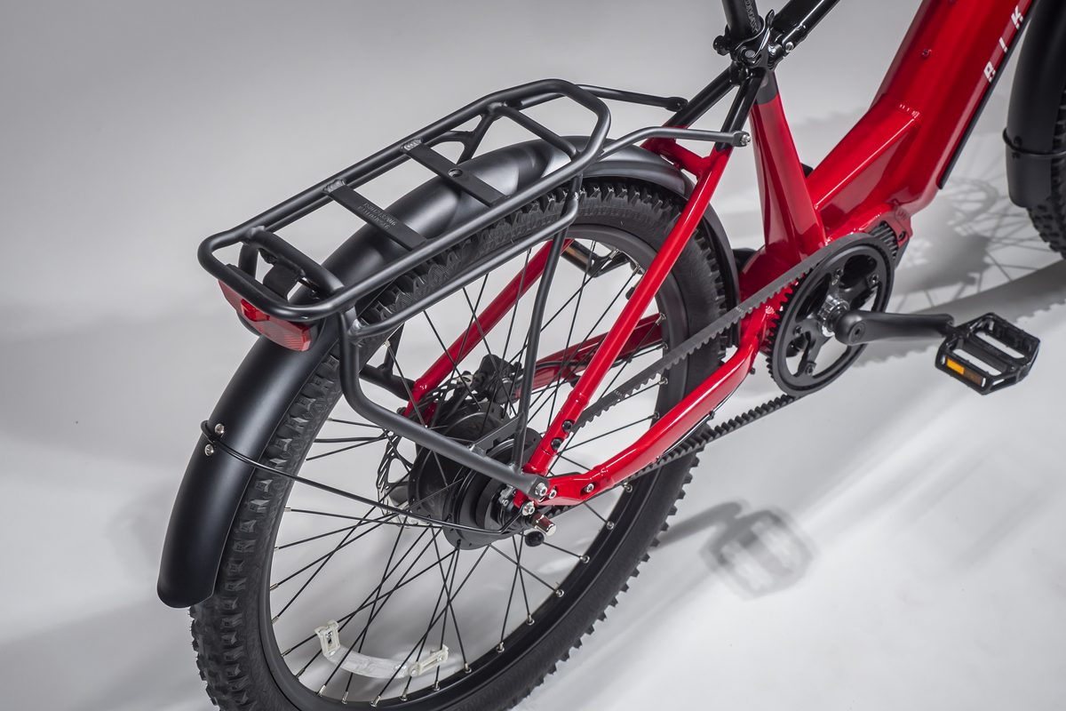 Close detail of the carbon belt drive and rear hub on a red Swift CVT